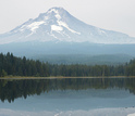 Mount Hood mirrored in a placid lake below